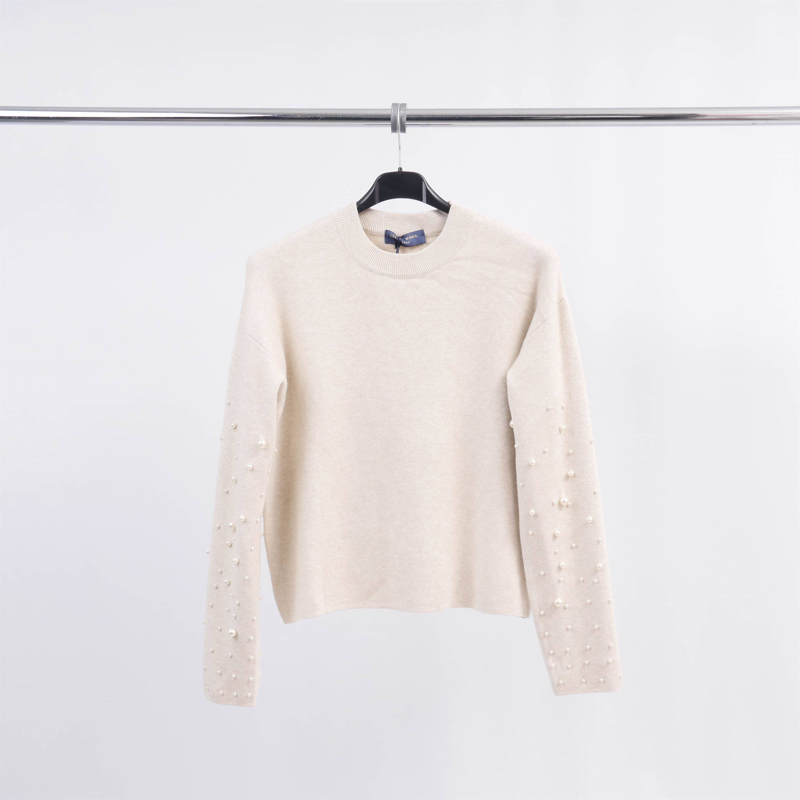 Pull col rond avec perles sur les manches DSY24226