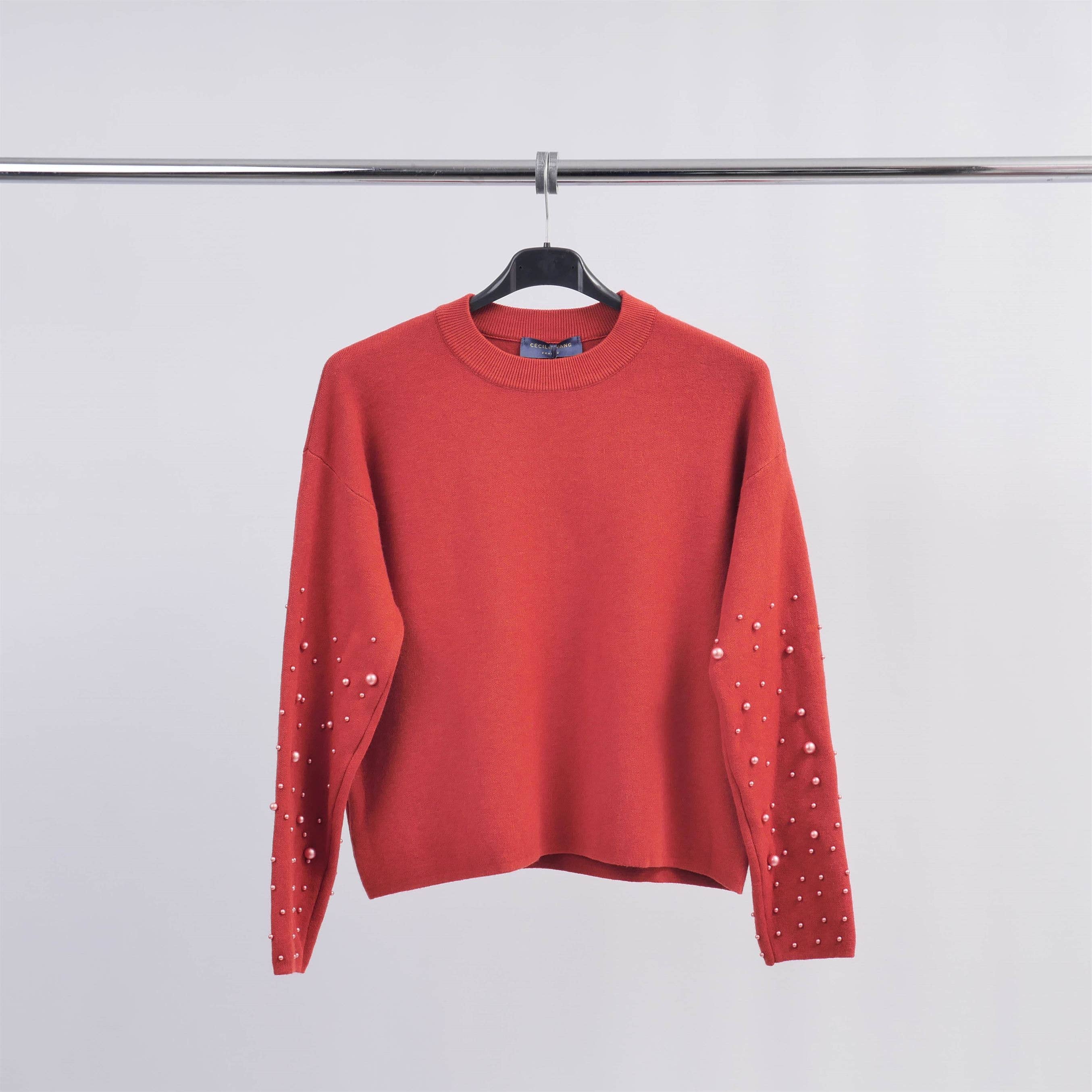 Pull col rond avec perles sur les manches DSY24226