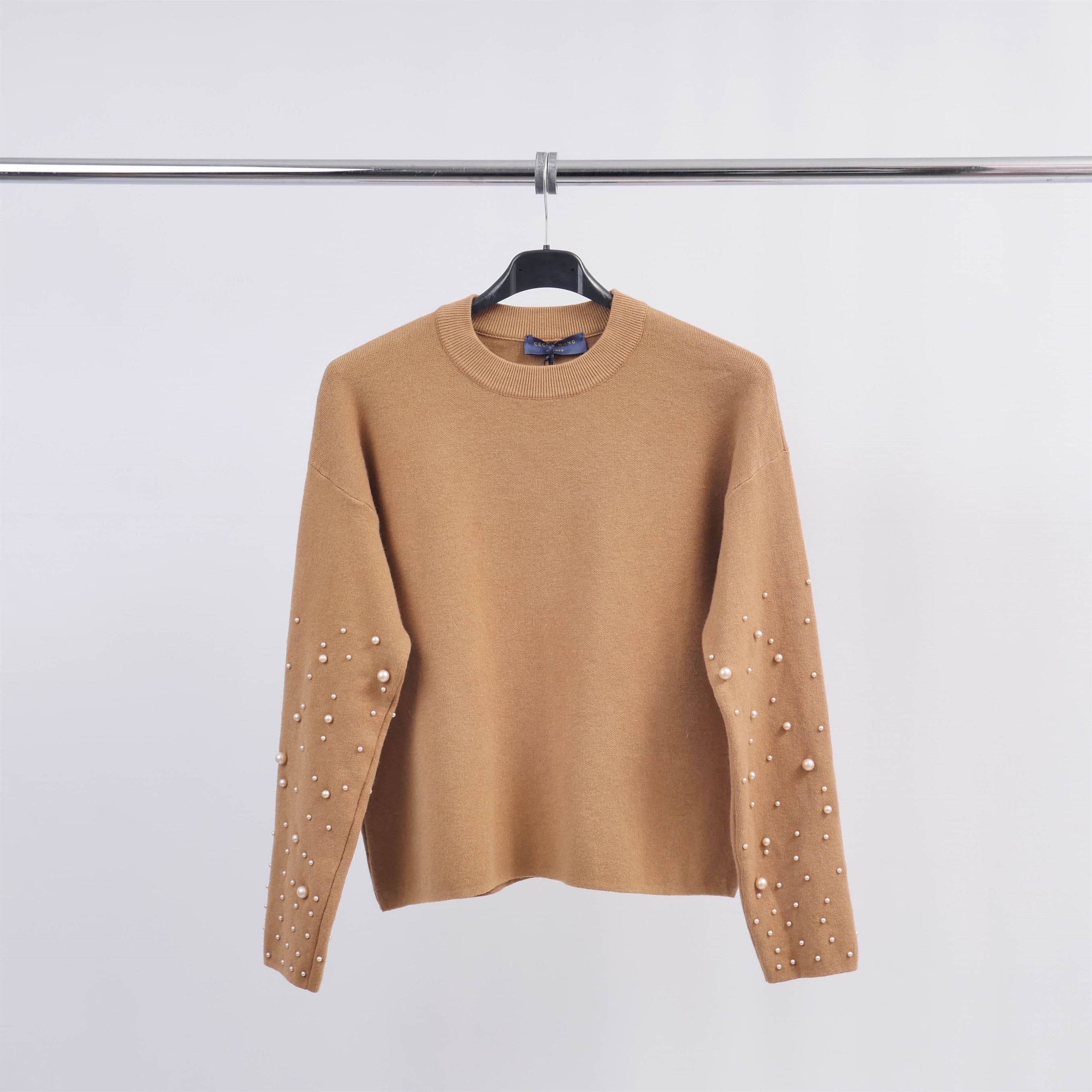 Pull col rond avec perles sur les manches DSY24226