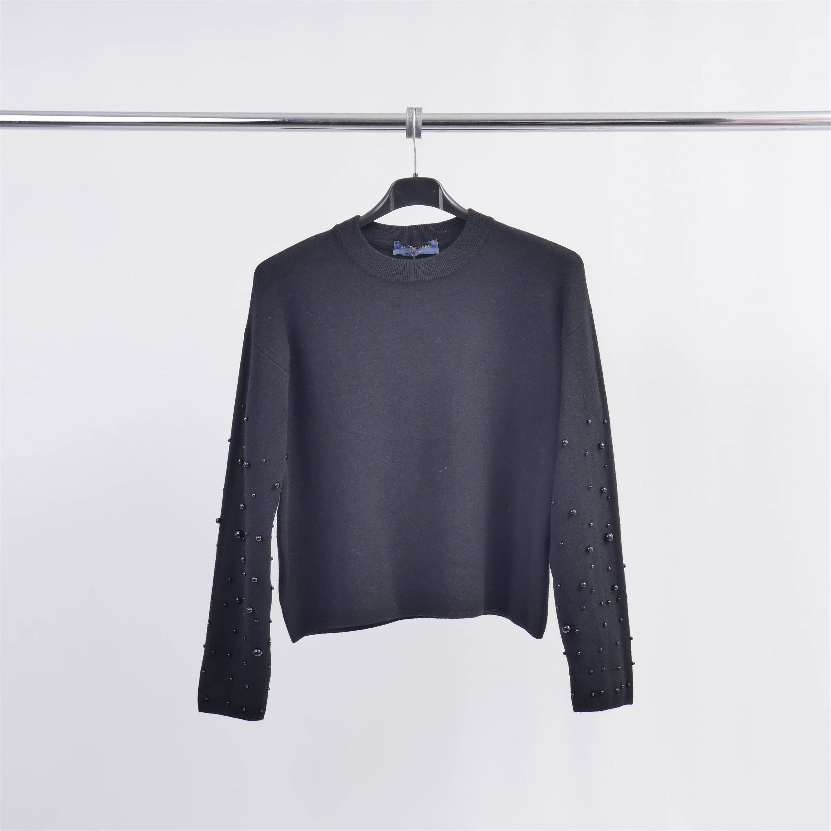 Pull col rond avec perles sur les manches DSY24226